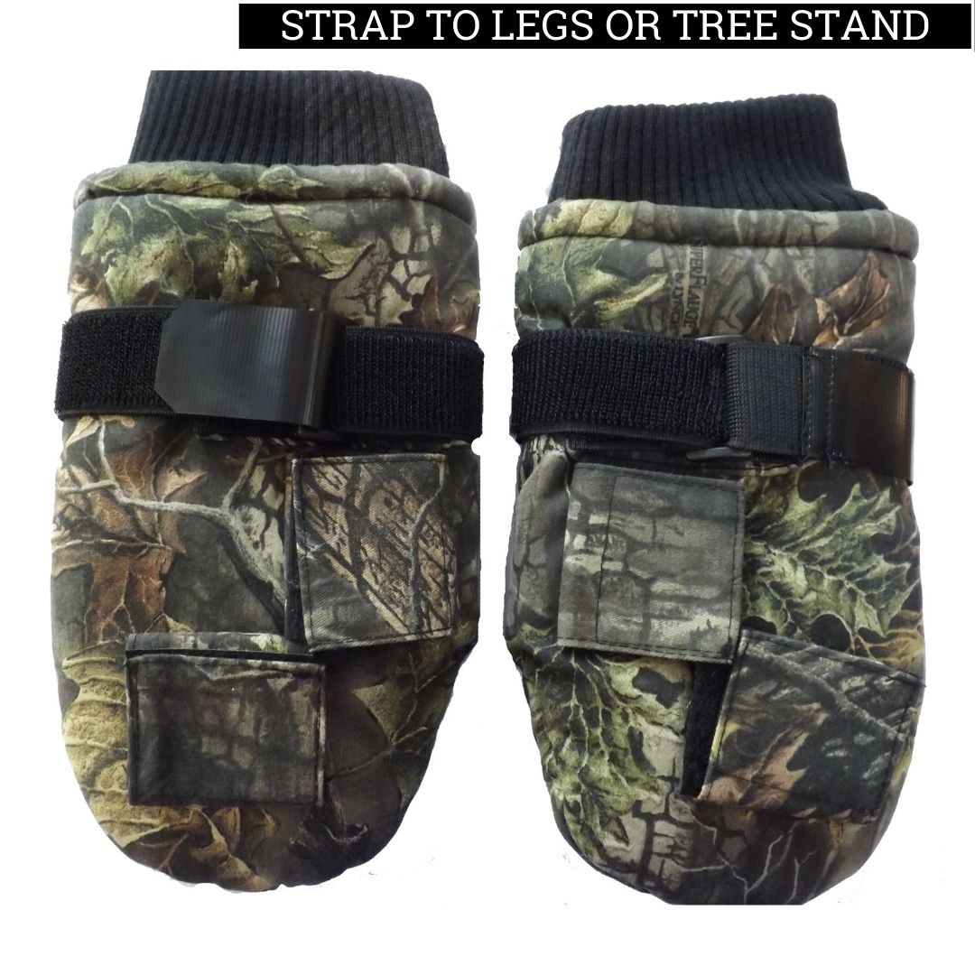 Two camouflaged Stand Mitts by Chill-N-Reel® featuring adjustable black straps and buckles on each. The mittens have a rugged, outdoor design suitable for winter outdoor activities like hunting. There's a label at the top that reads "STRAP TO LEGS OR TREE STAND.