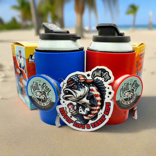 The 'Merica Bundle from Chill-N-Reel® features red and blue insulated tumblers with Redneck Fish Stickers, plus two fishing reel beverage holders—featured on Shark Tank—displayed on a beach with packaging in the background.