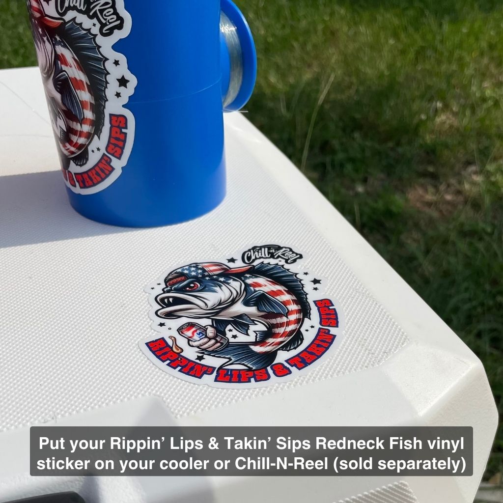 A white cooler features a circular vinyl sticker with a fish wrapped in an American flag and the text "Rippin' Lips & Takin' Sips." A blue koozie (Original Chill-N-Reel) is placed on the cooler. The text on the image promotes the Rippin' Lips & Takin' Sips Redneck Fish Vinyl Sticker (Chill-N-Reel not included), indicating that it's sold separately.