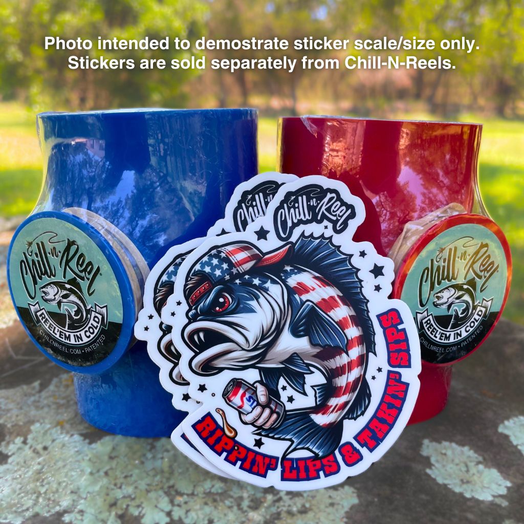 Two vibrant Chill-N-Reel can coolers, one blue and one red, are displayed outdoors. In the center, a detailed Rippin' Lips & Takin' Sips Redneck Fish Vinyl Sticker (Chill-N-Reel not included) boldly displays the phrase "Rippin' Lips & Takin' Sips," adding character to these eye-catching can coolers by Chill-N-Reel.