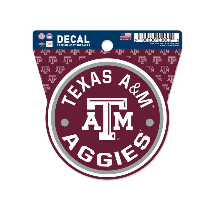 Show your team spirit with the Chill-N-Reel® Official NCAA Vinyl Decal Sticker—3.5" round, featuring a maroon and white Texas A&M logo and "Texas A&M Aggies" over a repeating ATM background. Perfect for fans who want licensed NCAA style!.