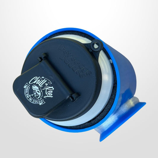 The image displays a black and blue drinking accessory, identified as the "Spill Guard for Chill-N-Reel," designed for cooling or holding soda or beer cans. It features a logo reading "Chill-N-Reel" and a graphic of a fish with the phrase "Reel Em' N Cold.