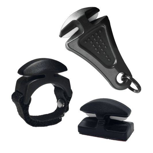 The Line Cutterz "TRIPLE PLAY" Fishing Line Cutter Multi-Pack includes three black plastic and metal cutters with white accents: a keyring clip, a strap-attached cutter, and a compact rectangular clip with an adhesive base.