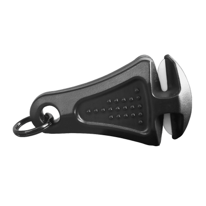 The Line Cutterz Ceramic Blade Zipper Pull is a black keychain tool with a textured grip and small slot, designed for cutting fishing lines or sharpening blades.