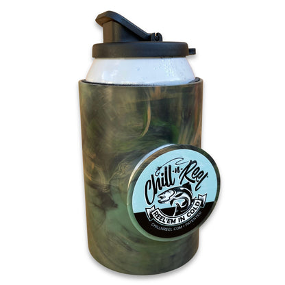A camo can cooler with a black flip-top lid, featuring a circular logo on the side that says "Chill-N-Reel Reel em in Cold" with an image of a fish. This fun fishing gift includes the website "chillnreel.com" and a patent number. The product is called the Original Chill-N-Reel from Chill-N-Reel.