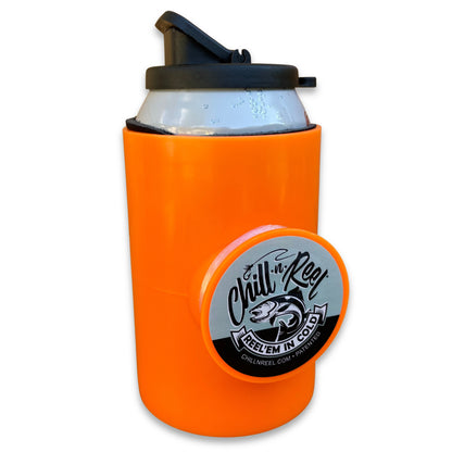 An orange beverage holder, also known as the Original Chill-N-Reel, features a reel attached to the side and a silver and black label reading "Reel’em In Cold." This Shark Tank product by Chill-N-Reel holds a white drink can with condensation and has a black flip-top cover. It's the perfect fun fishing gift for any angler.