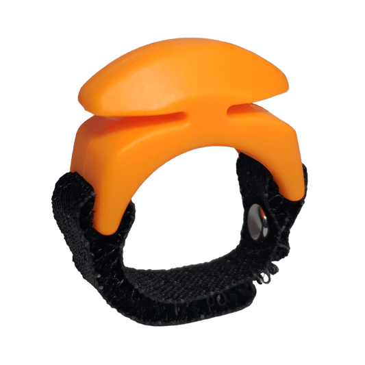 The Line Cutterz Ceramic Blade Ring by Line Cutterz is an orange plastic fishing line cutter with a curved top and two slots, attached to a black adjustable strap with snap button. This rust-proof tool offers durability and convenience.