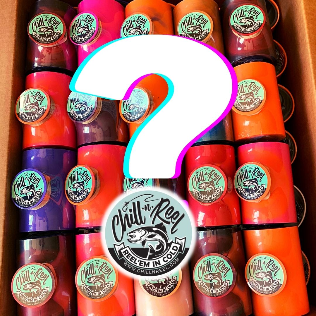 A colorful assortment of Chill-N-Reel® drink holders in shades of pink, orange, red, and purple are neatly arranged in a box. A large white question mark outlined in blue and pink is prominently placed over the center, hinting at the Mystery Color Chill-N-Reel. The Chill-N-Reel® logo is displayed at the bottom.